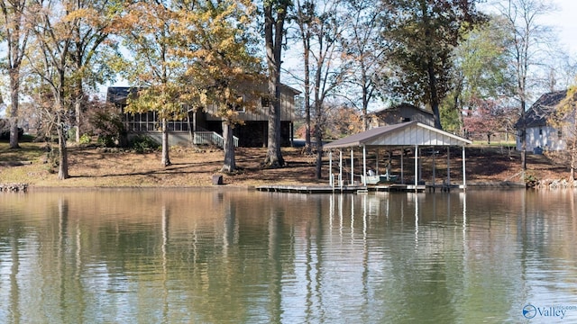 exterior space with a water view