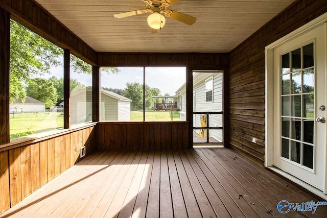 unfurnished sunroom with a sauna and ceiling fan