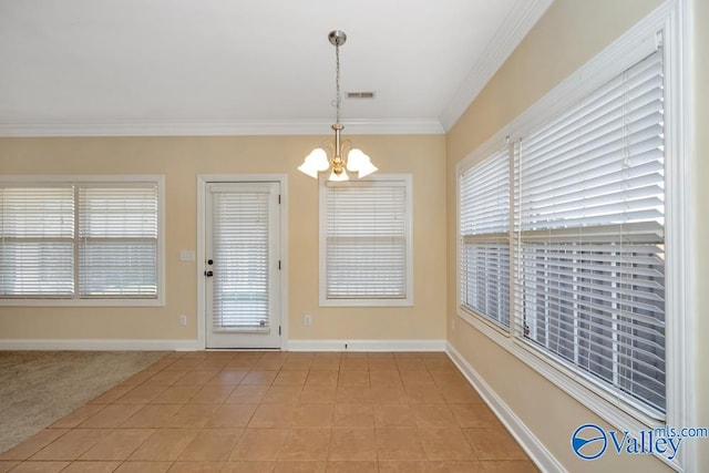 unfurnished dining area with tile patterned flooring, a chandelier, and ornamental molding