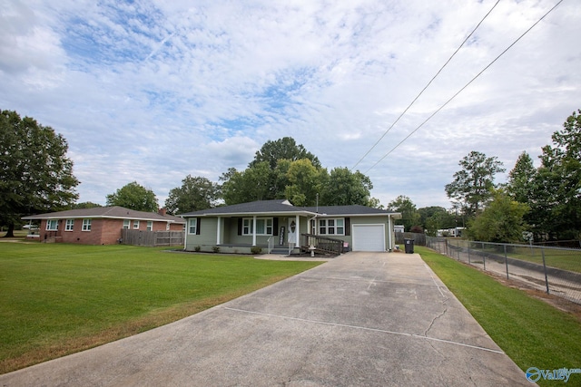 ranch-style home with a garage, a porch, and a front lawn