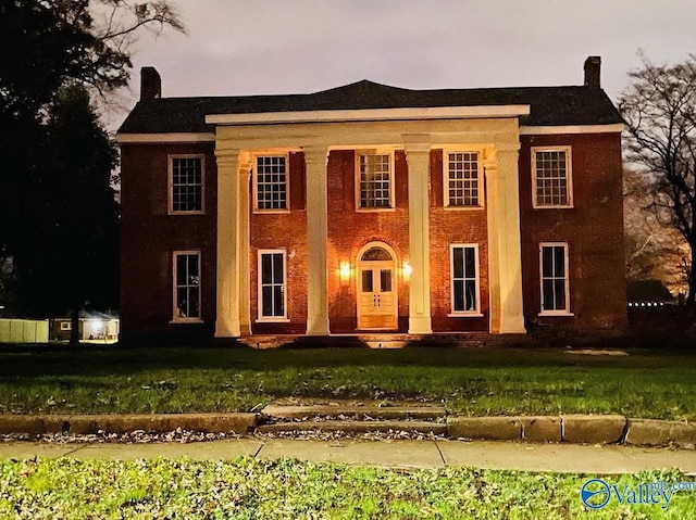 401 S Clinton St, Athens, AL 35611 - neoclassical home featuring a chimney and a front yard