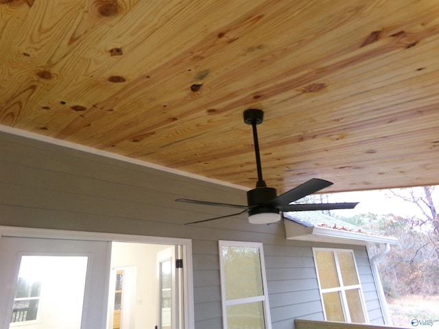 exterior details featuring ceiling fan