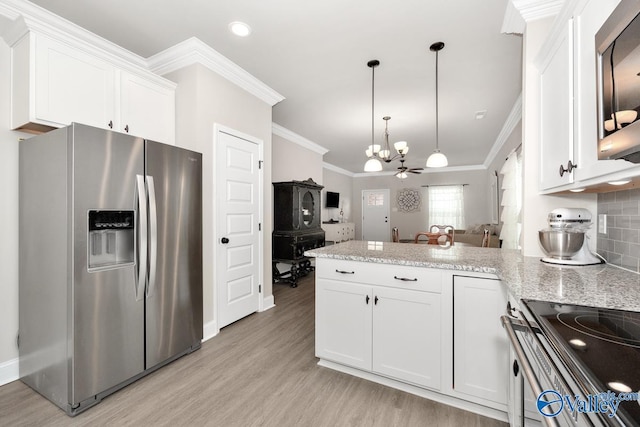 112 Elledge Farm Dr, Hazel Green, AL 35750 - kitchen featuring appliances with stainless steel finishes, ornamental molding, a chandelier, a peninsula, and light wood-style flooring