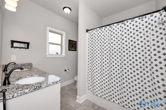 112 Elledge Farm Dr, Hazel Green, AL 35750 - full bathroom featuring toilet, baseboards, a shower with shower curtain, and vanity