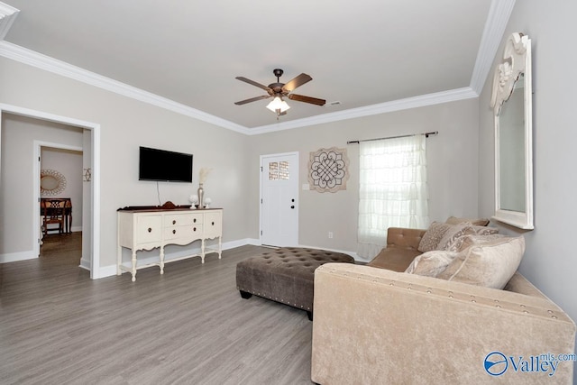 112 Elledge Farm Dr, Hazel Green, AL 35750 - living area with ornamental molding, ceiling fan, wood finished floors, and baseboards