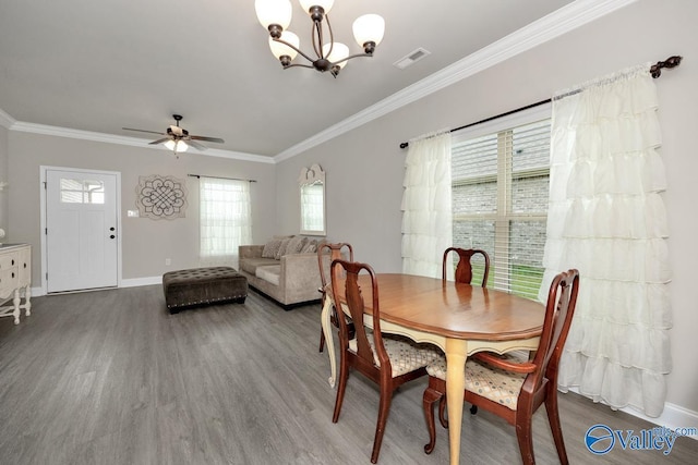 112 Elledge Farm Dr, Hazel Green, AL 35750 - dining space with wood finished floors, ornamental molding, a chandelier, baseboards, and a ceiling fan