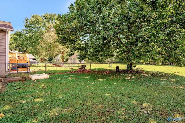 view of yard featuring a wooden deck