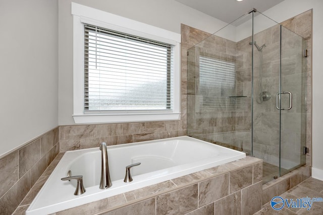 bathroom with independent shower and bath