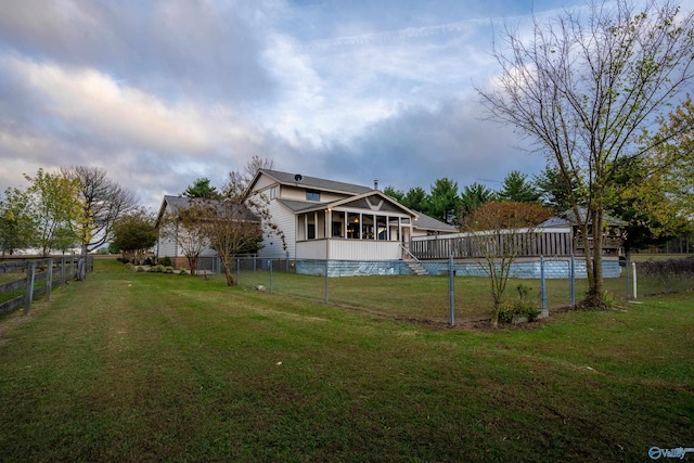 view of yard with a sunroom