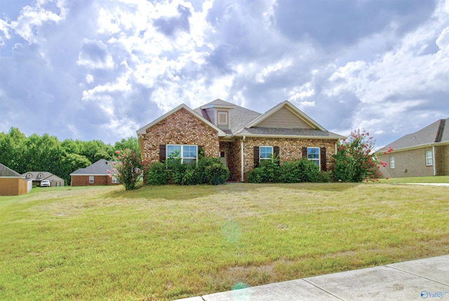 view of front facade with a front yard