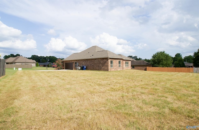 view of yard featuring a garage