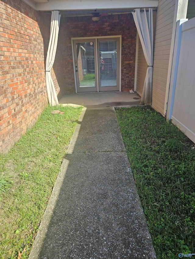 doorway to property featuring a patio