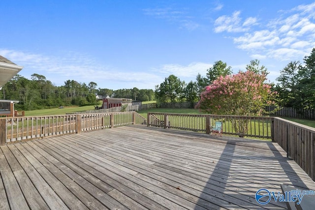 deck featuring a lawn