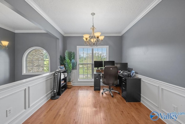 office with crown molding, a chandelier, light hardwood / wood-style floors, and a textured ceiling