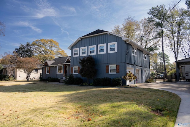 view of front property with a front yard and a garage