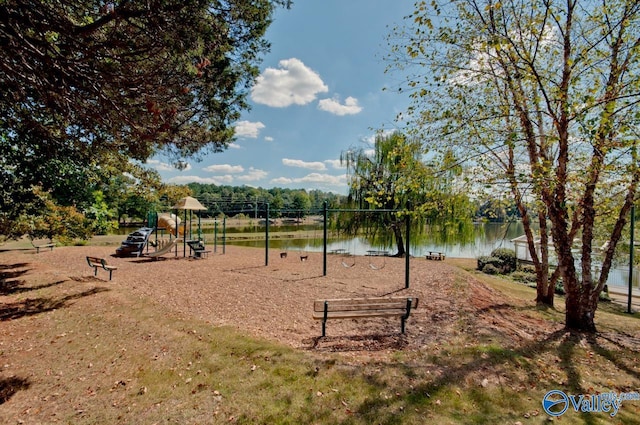 community jungle gym featuring a water view