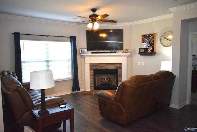 living area featuring crown molding, a fireplace, ceiling fan, wood finished floors, and baseboards