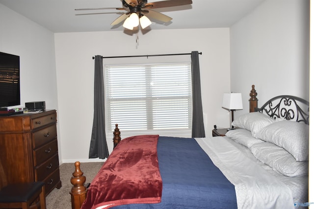 carpeted bedroom featuring a ceiling fan