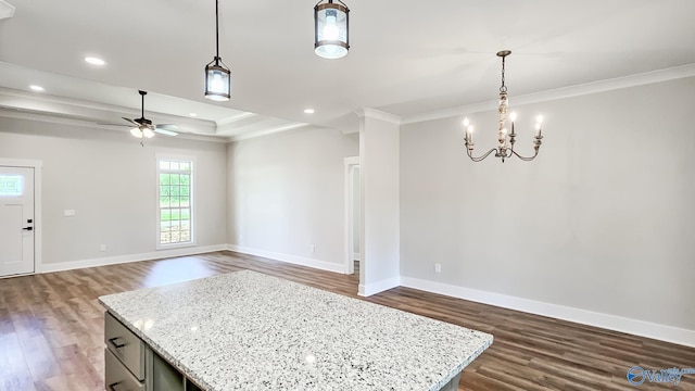 15685 Huntsville Brownsferry Rd, Athens, AL 35611 - unfurnished dining area with dark wood-type flooring, crown molding, ceiling fan with notable chandelier, and baseboards