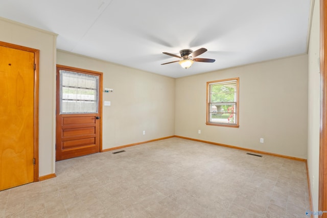 113 Gordon Dr, Athens, AL 35611 - empty room featuring a ceiling fan, baseboards, and light flooring
