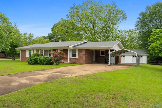 113 Gordon Dr, Athens, AL 35611 - single story home with concrete driveway, a front yard, brick siding, and a detached carport
