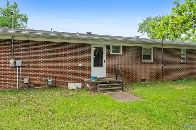 113 Gordon Dr, Athens, AL 35611 - back of house featuring a yard, brick siding, and crawl space