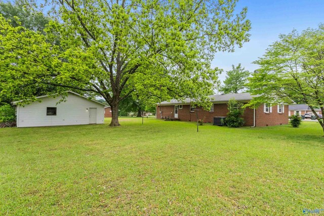 113 Gordon Dr, Athens, AL 35611 - view of grassy yard with central AC