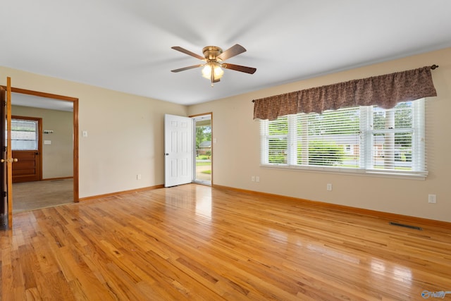 113 Gordon Dr, Athens, AL 35611 - empty room featuring a ceiling fan, light wood-style floors, and baseboards