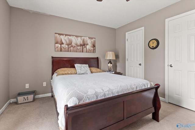 194 Bonaire Dr, Huntsville, AL 35811 - bedroom featuring light carpet, baseboards, and ceiling fan