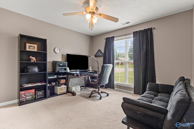 194 Bonaire Dr, Huntsville, AL 35811 - carpeted home office featuring ceiling fan, a textured ceiling, and baseboards