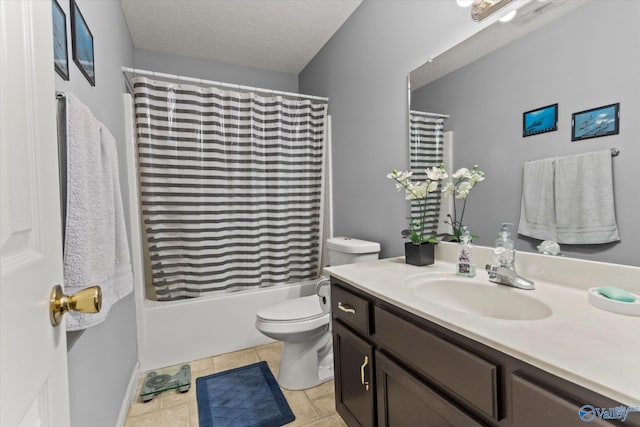 194 Bonaire Dr, Huntsville, AL 35811 - bathroom with vanity, toilet, shower / bathtub combination with curtain, and a textured ceiling