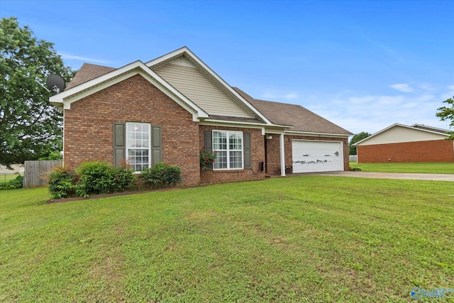 194 Bonaire Dr, Huntsville, AL 35811 - view of front of house featuring driveway, a garage, and brick siding