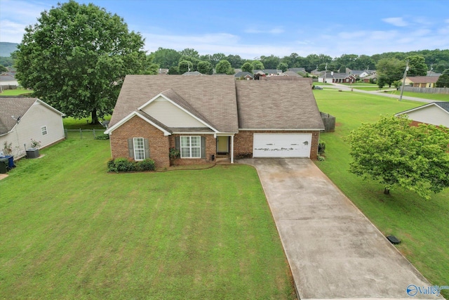 194 Bonaire Dr, Huntsville, AL 35811 - view of front of home featuring brick siding, a garage, and driveway