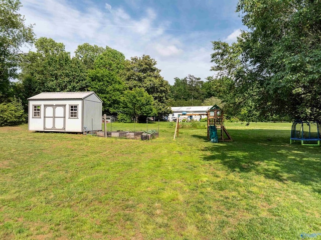 331 Ayers Cir, Grant, AL 35747 - view of grassy yard featuring a trampoline, a playground, and view of scattered trees