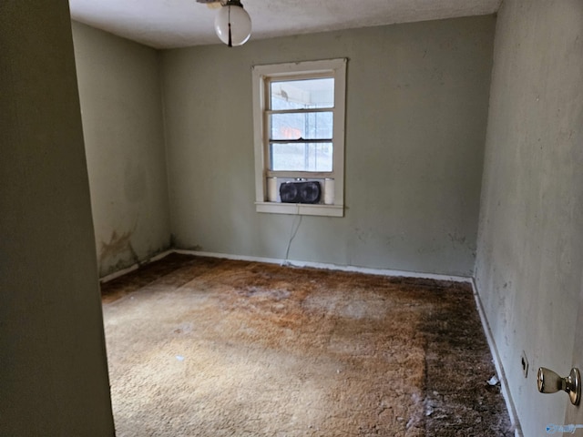 unfurnished room with carpet floors