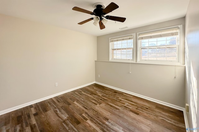 unfurnished room with hardwood / wood-style floors and ceiling fan