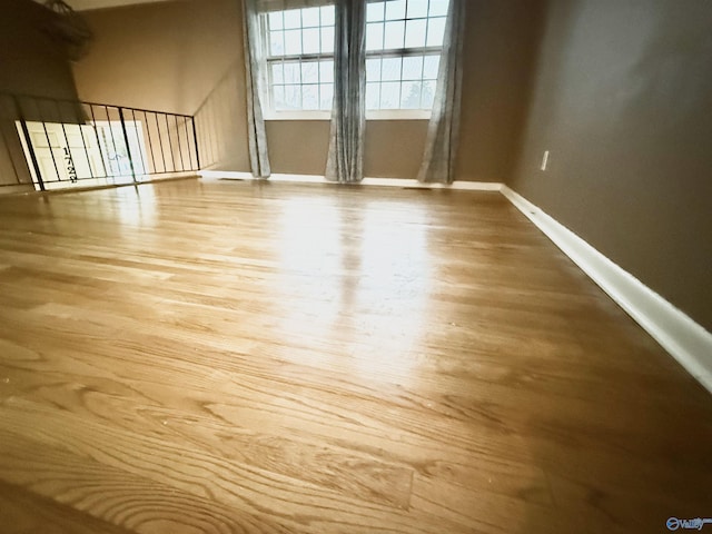 unfurnished room featuring light hardwood / wood-style flooring