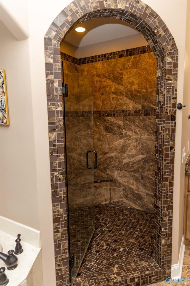 bathroom featuring walk in shower