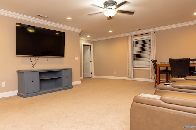 living room featuring ornamental molding, ceiling fan, and light carpet