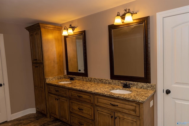 bathroom featuring hardwood / wood-style floors and vanity