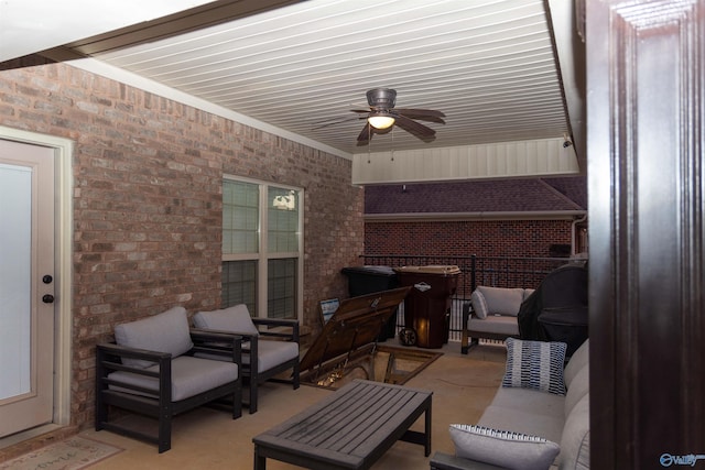 view of patio / terrace featuring ceiling fan and an outdoor living space