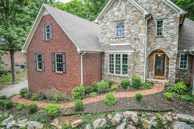 front of property featuring cooling unit