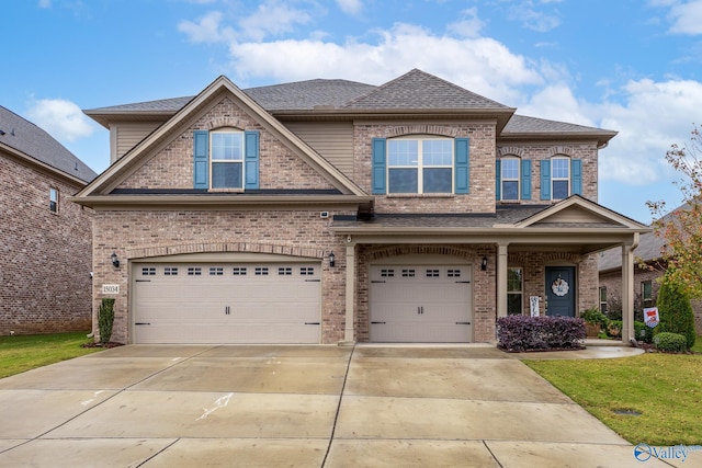 craftsman inspired home with a garage