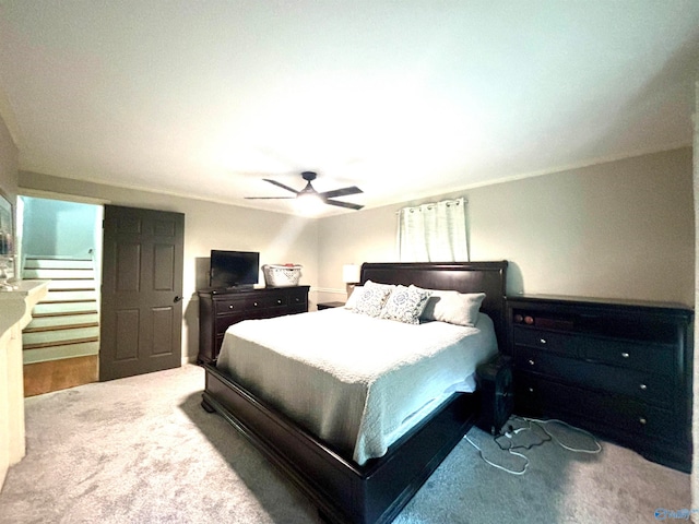 bedroom with carpet and ceiling fan