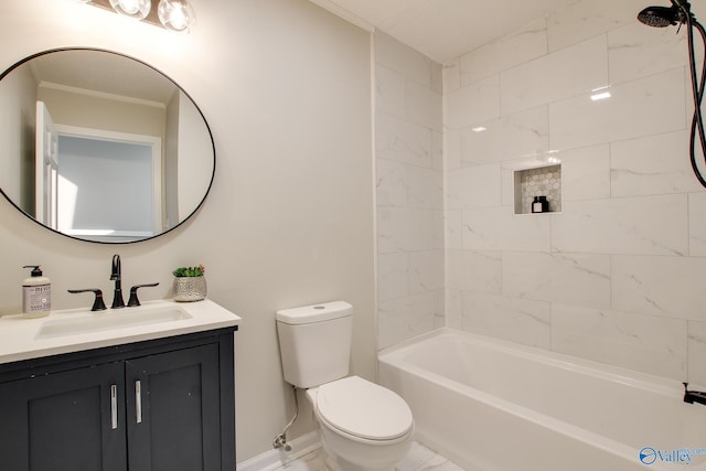 full bathroom featuring vanity, tiled shower / bath combo, and toilet