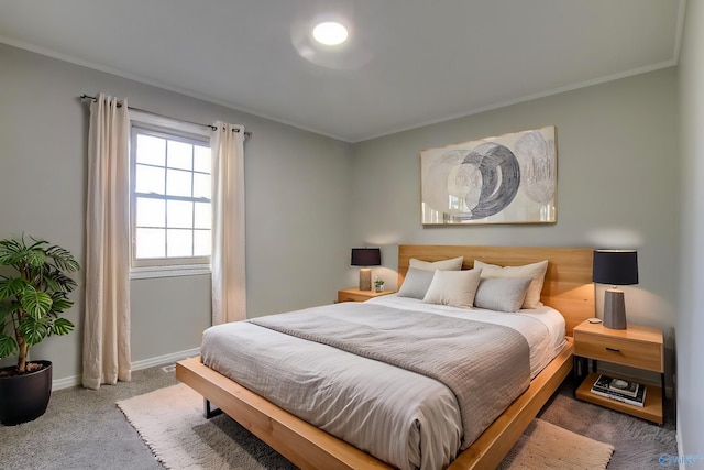 carpeted bedroom with ornamental molding