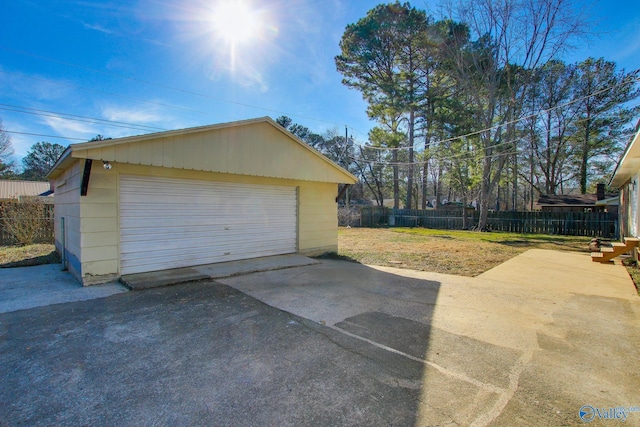 garage with a lawn