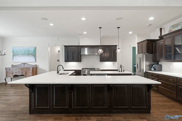 11 SE Braewick Pl, Gurley, AL 35748 - kitchen featuring a large island with sink, a sink, backsplash, stove, and recessed lighting