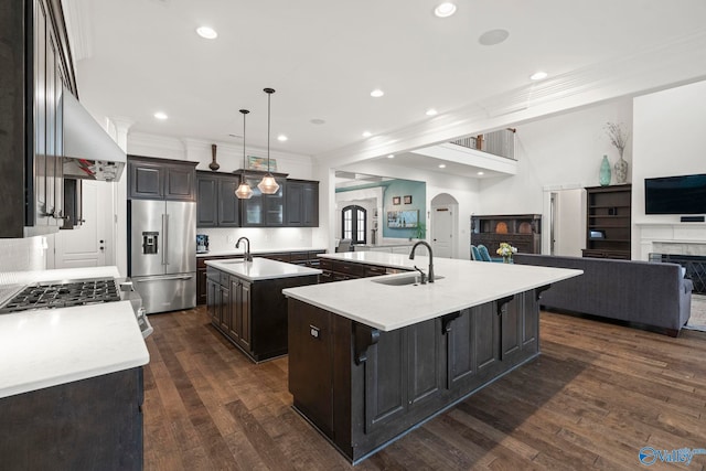 11 SE Braewick Pl, Gurley, AL 35748 - kitchen featuring high quality fridge, a large island, crown molding, open floor plan, and a sink