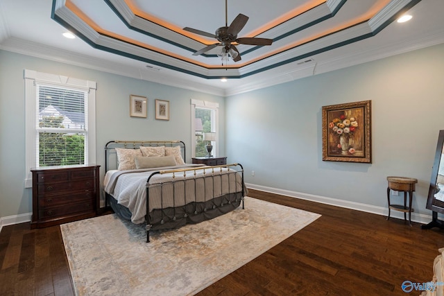 11 SE Braewick Pl, Gurley, AL 35748 - bedroom featuring a tray ceiling, ornamental molding, multiple windows, dark wood-type flooring, and recessed lighting